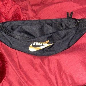 Black and gold Nike satchel. Never worn.